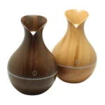 Електрически арома дифузер с дървесен дизайн, подходящ за ароматерапия, с височина 16 см, показан на бял фон